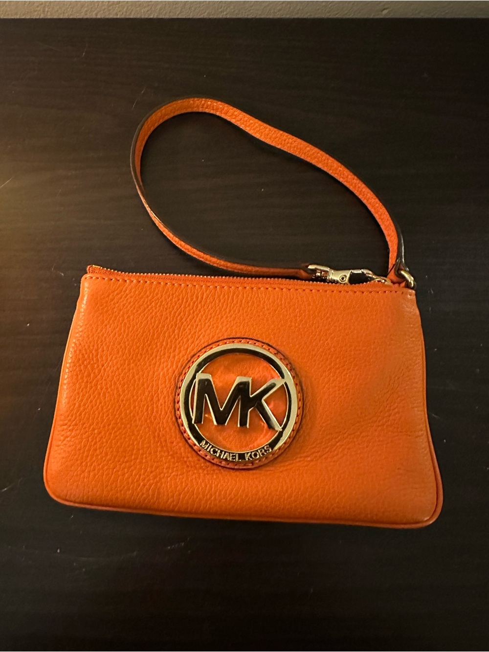 Michael Kors Orange Pebbled Leather Wristlet with MK Emblem